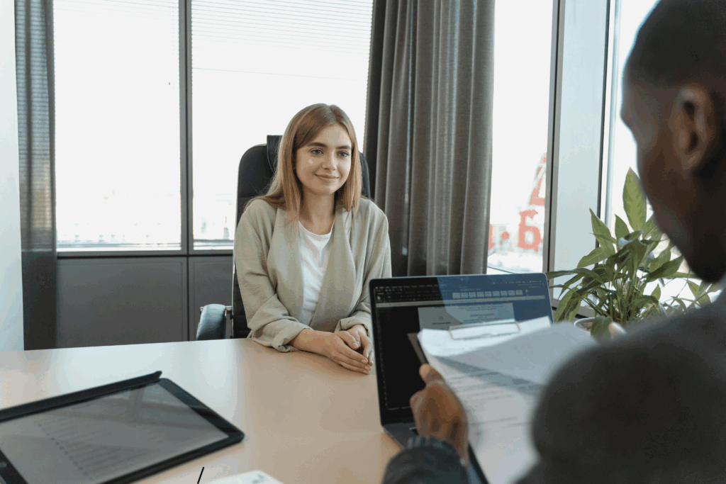 Two professionals in a continuous employee vetting process